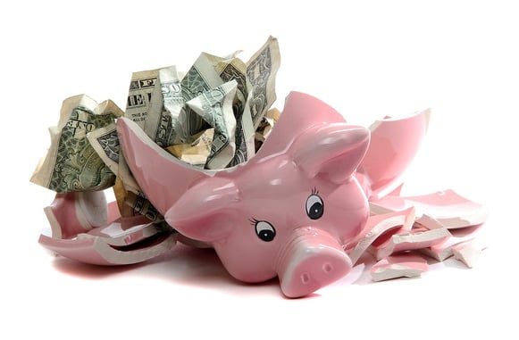 bigstock-Broken-Piggybank-With-Dollar-N-30624272.jpg