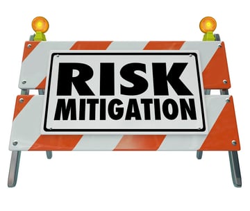 bigstock-Risk-Mitigation-words-on-a-roa-100492145.jpg