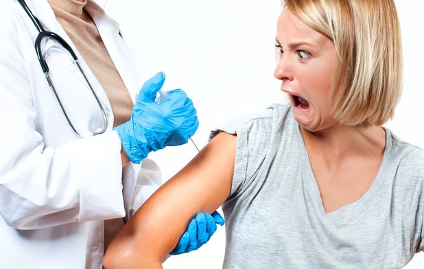 bigstock-Vaccination-Doctor-Injecting--206960932.jpg